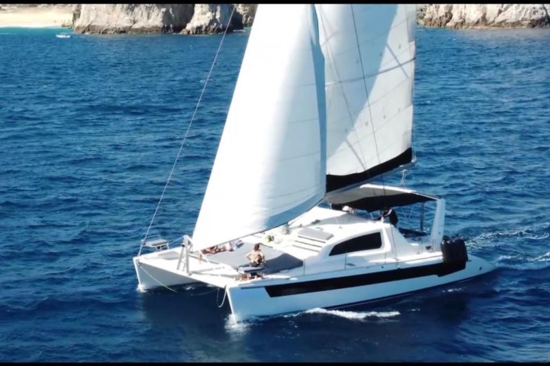 52-foot Leopard sailing catamaran under full sail off the Cabo coast